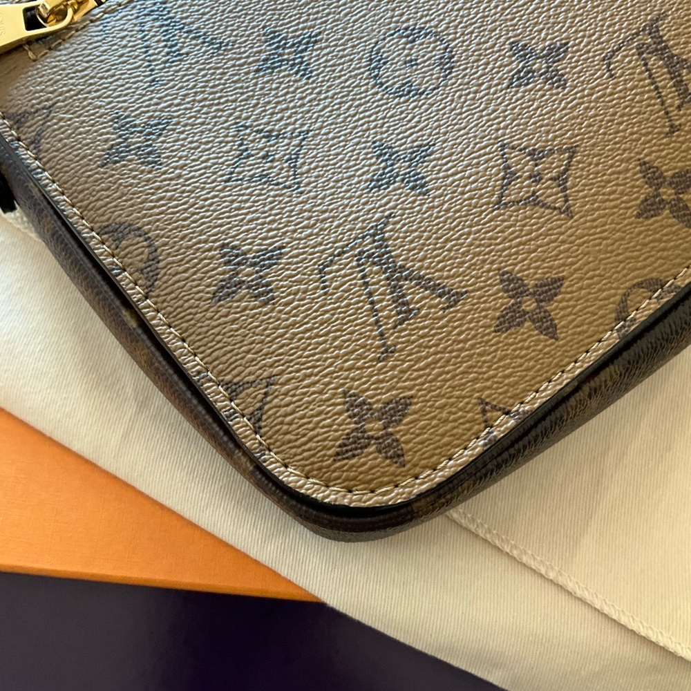 Sold Louis Vuitton Reverse Monogram Pouchette Métis - Picture 13 of 16
